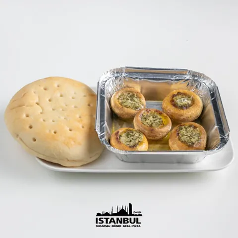 Champignons in kruidenboter