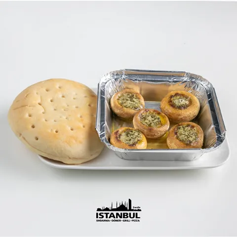 Champignons in kruidenboter