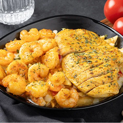 Creamy cajun grilled chicken en shrimp pasta