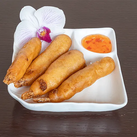 Gepaneerde garnalen met pikante saus
