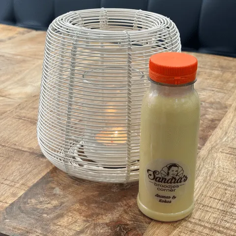 Banaan, ananas en kokos smoothie